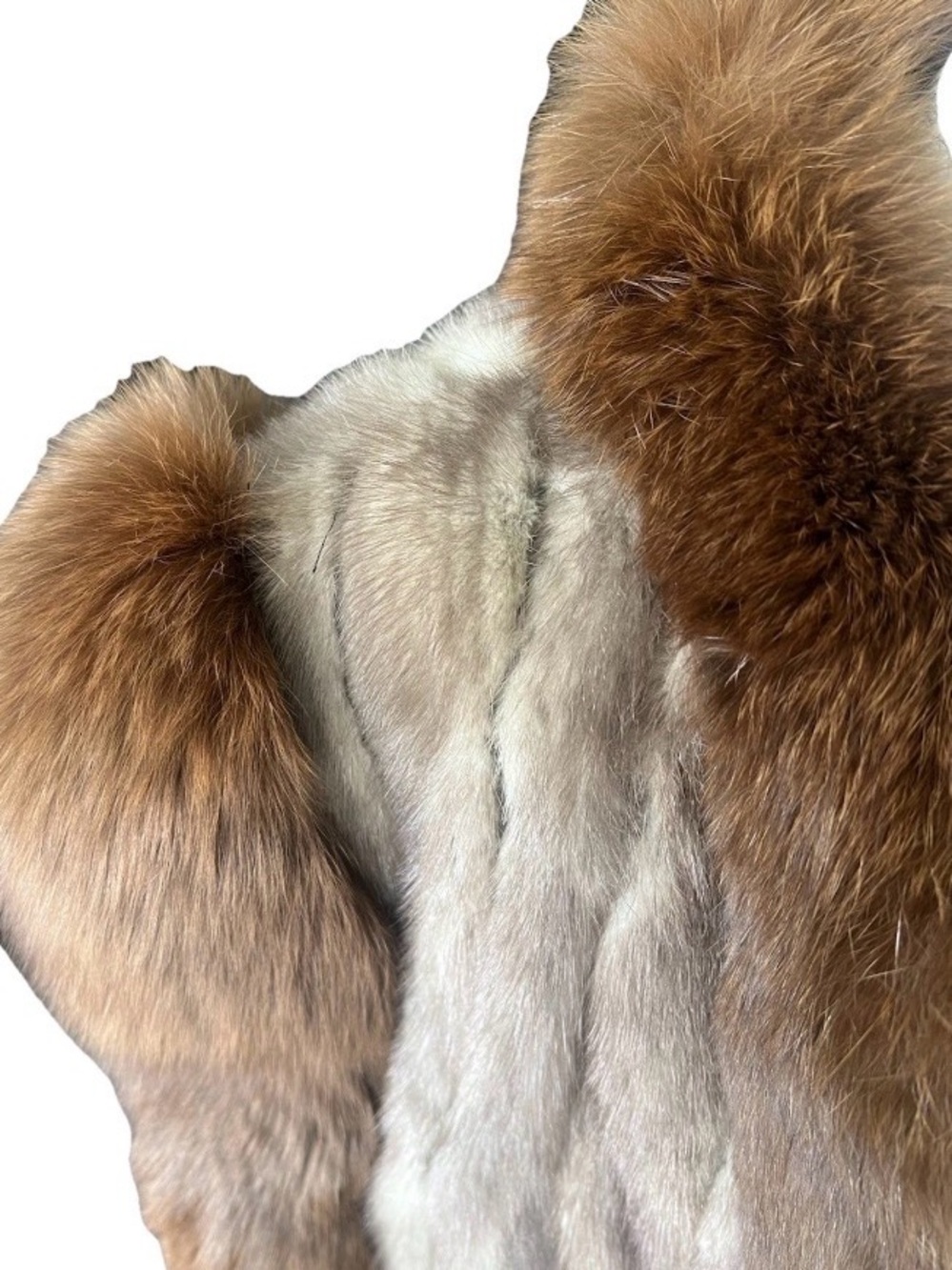 Luxurious Brown and Cream Fur Jacket
Tuxedo look appealing and pre-owned.